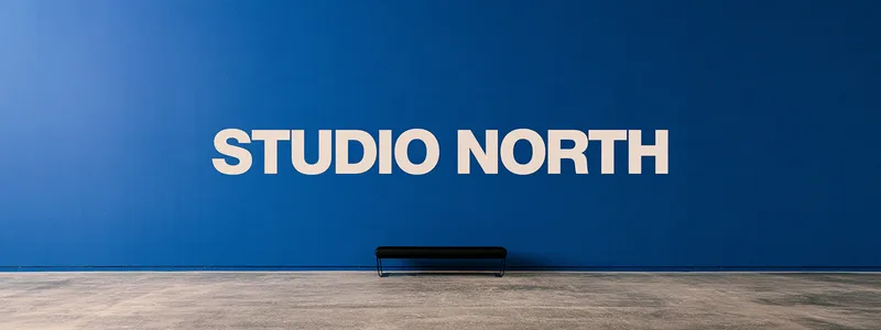 Studio North — the wordmark in white capitals across a cobalt blue reception wall