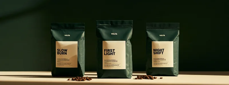 Volta Coffee — three forest green bags labelled Slow Burn, First Light and Night Shift